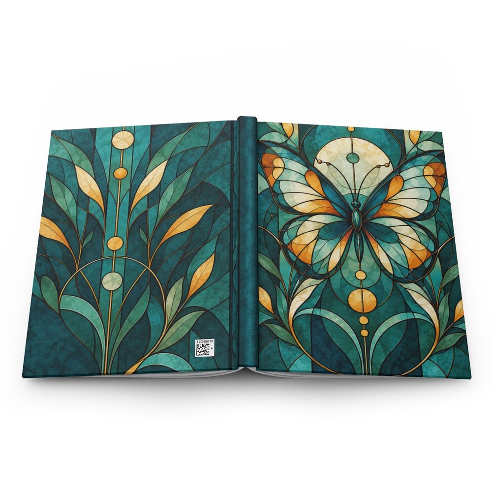 Stained Glass Butterfly hardcover journal shown open flat, a symmetrical stained-glass butterfly and leaf shapes in teal and amber wrapping across the front, spine and back cover