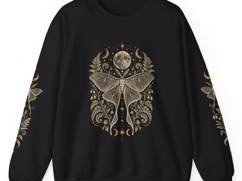 Luna Moth crewneck sweatshirt in black, with moth and fern prints running down both sleeves