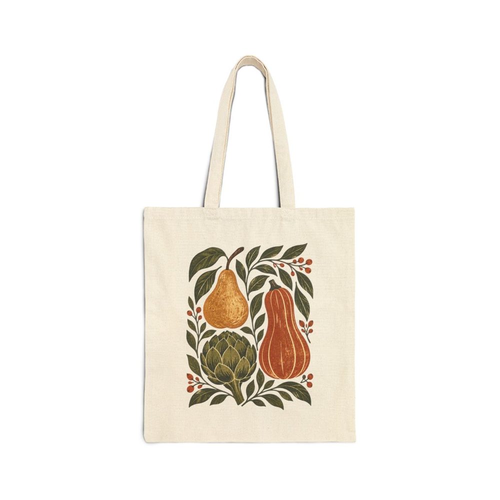 Autumn Vegetable tote bag in natural cotton canvas, printed with a folk-art harvest of a pear, squash and artichoke framed by leaves
