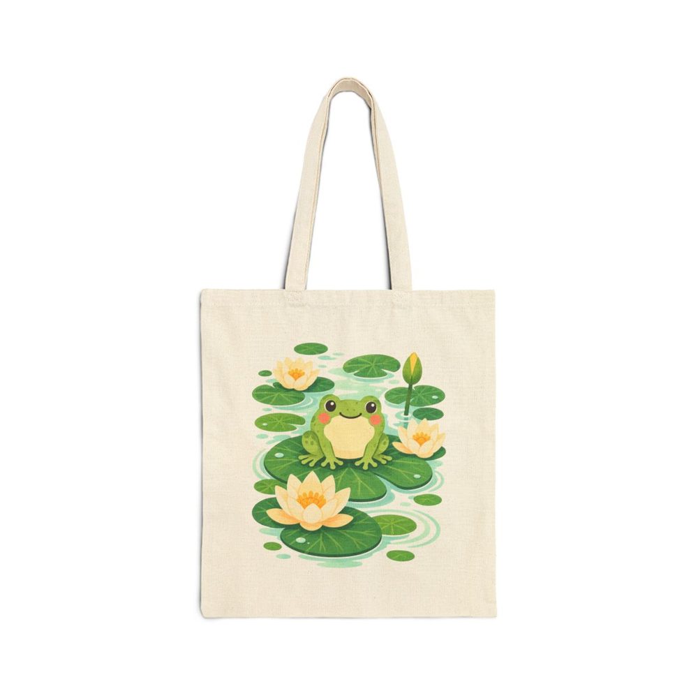 Frog and Water Lily tote bag in natural cotton canvas, printed with a smiling green frog sitting among lily pads and white water lilies