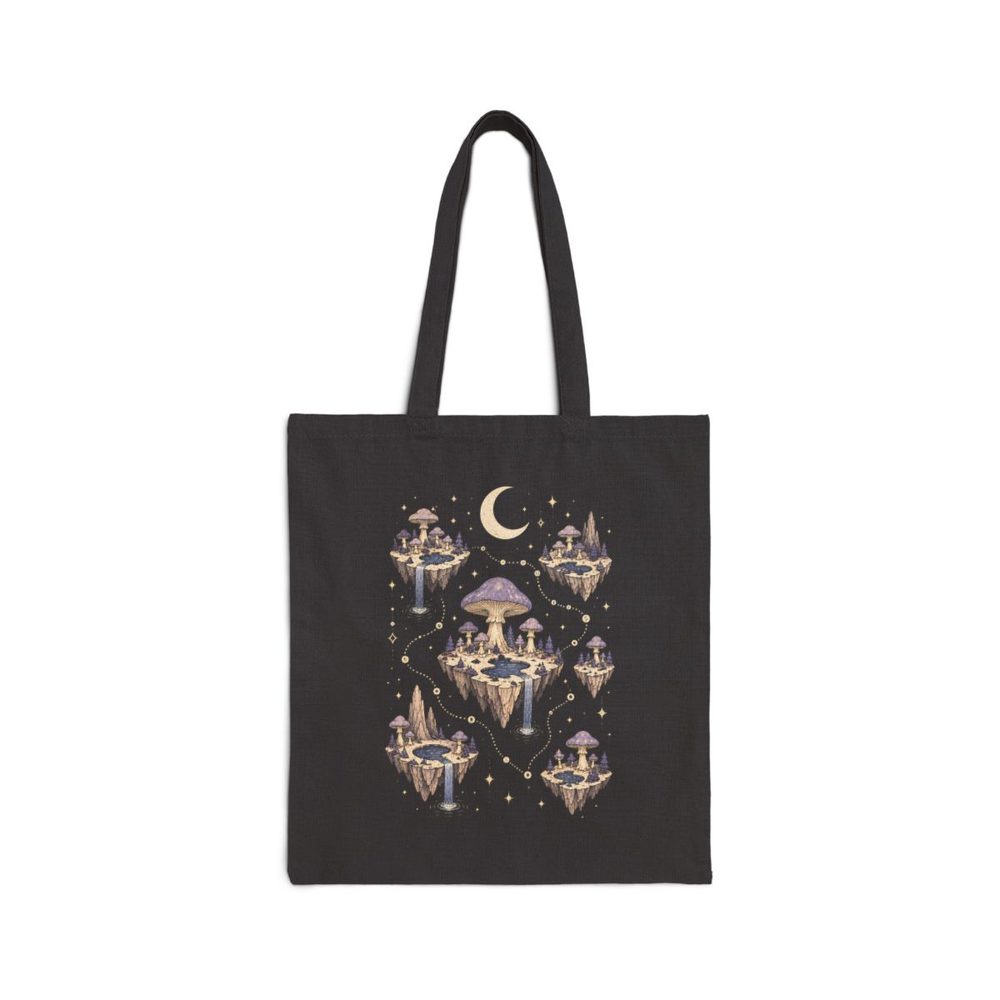 Moonlit Mushroom Map tote bag in black cotton canvas, printed with glowing mushroom islands linked by dotted paths under crescent moons