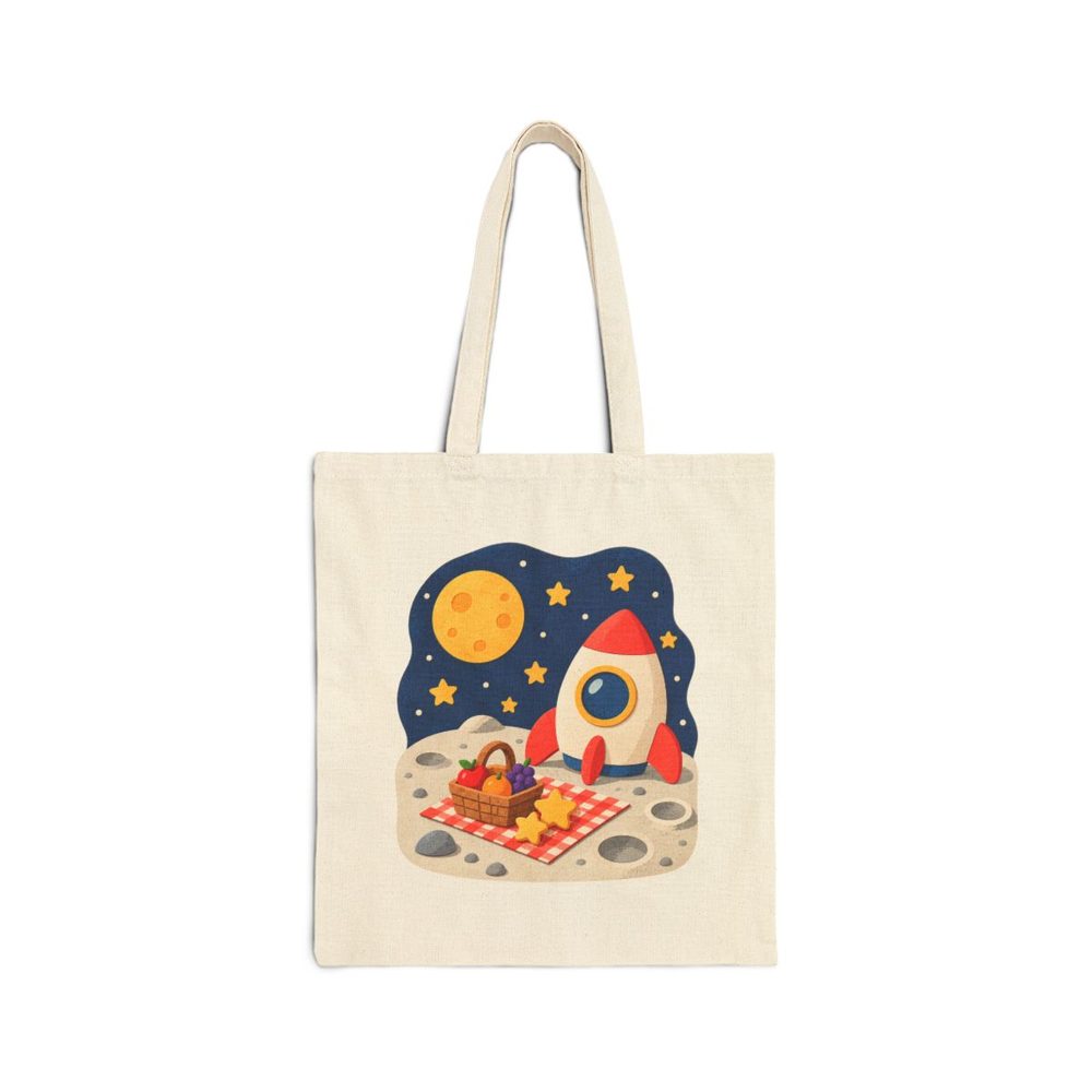 Retro Rocket Picnic tote bag in natural cotton canvas, printed with a small red and white rocket beside a picnic blanket on the moon under a starry sky